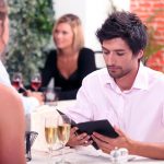 Men pay the dinner bill on the first date